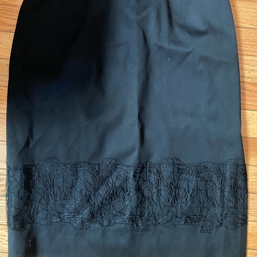 Carolina Herrera wool pencil skirt, just above the knew, slit on side. Very new.